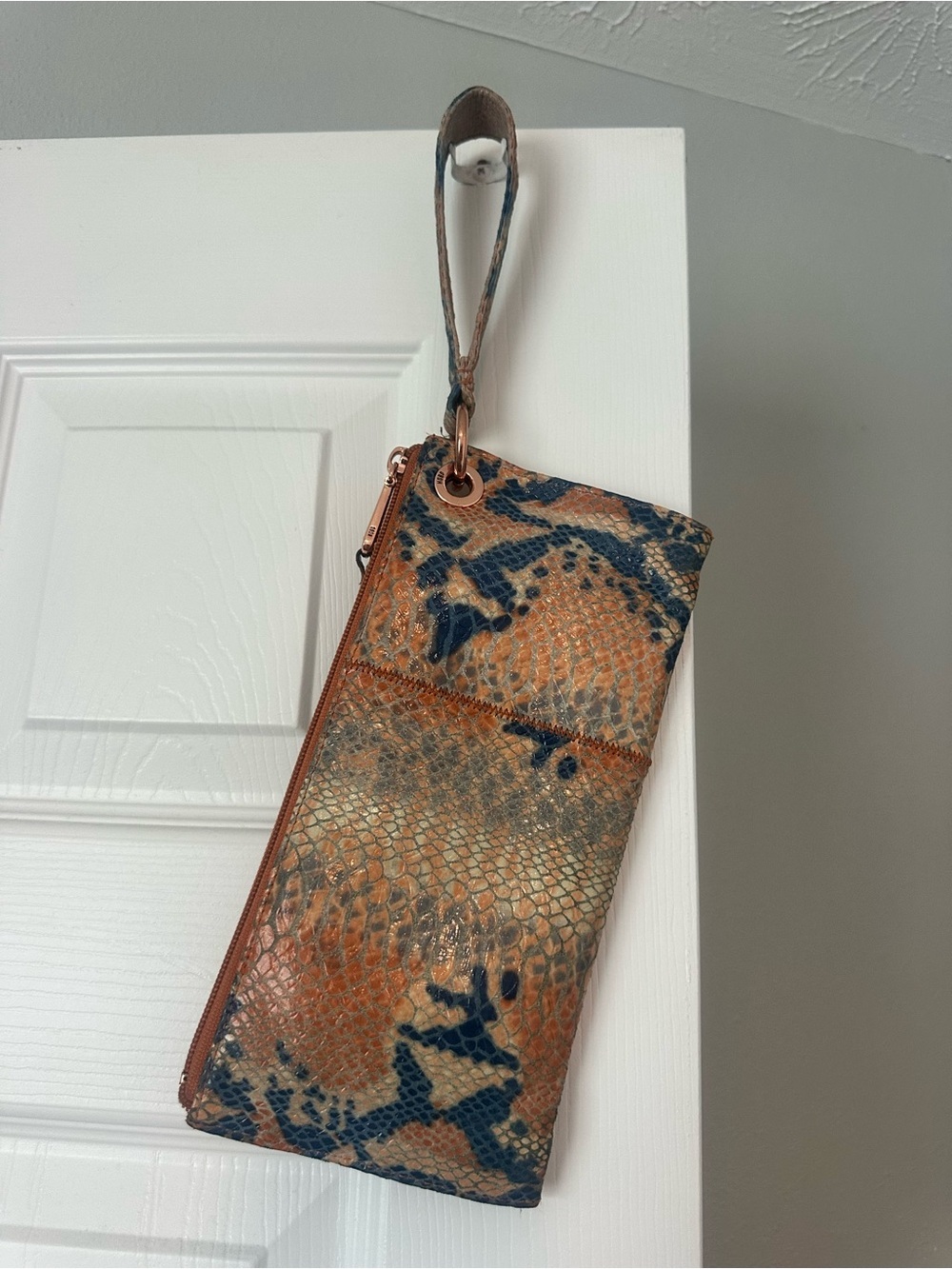 Snake print wristlet by HOBO